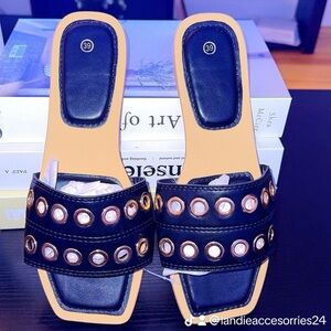 Stylish Black Sandals with Gold Accents